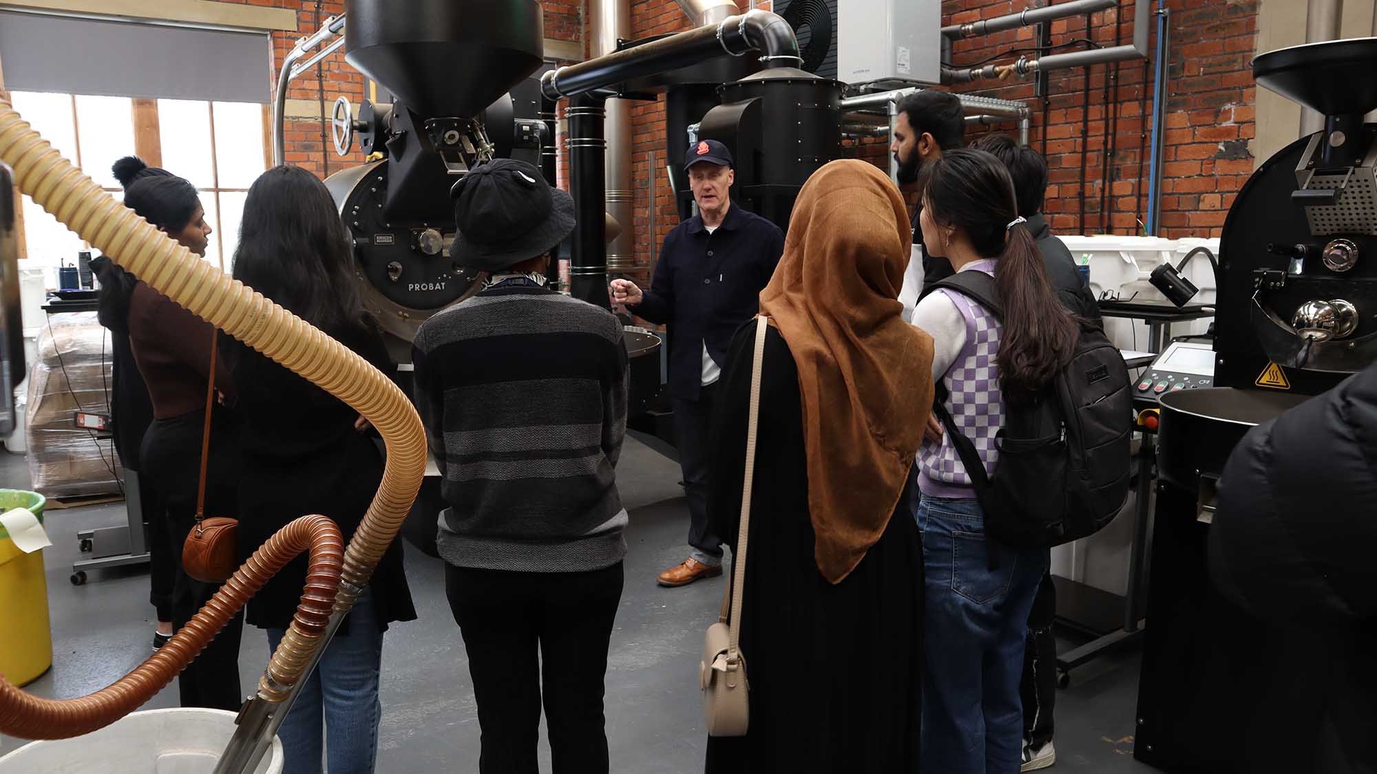 Students vising Darkwoods Coffee as part of Bud in Hud