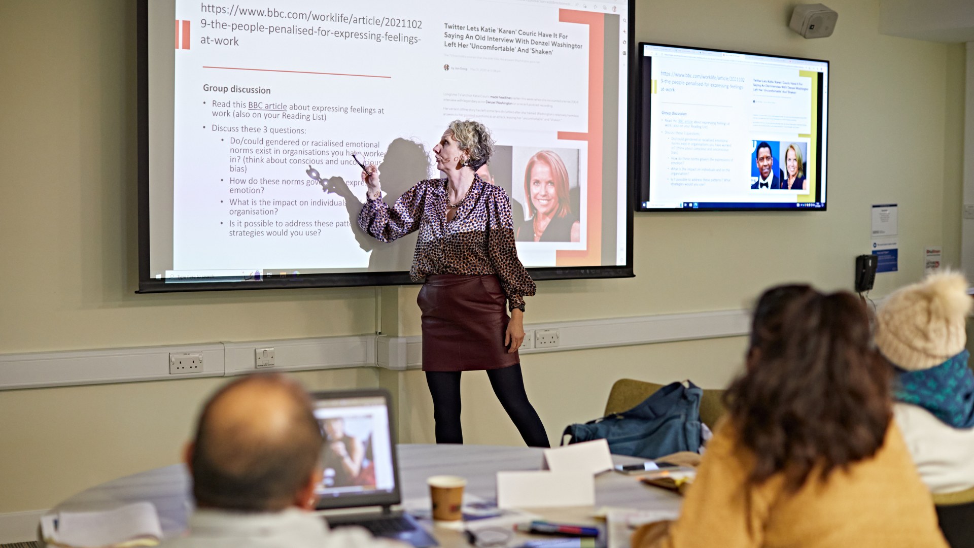 Students participating in an MBA class