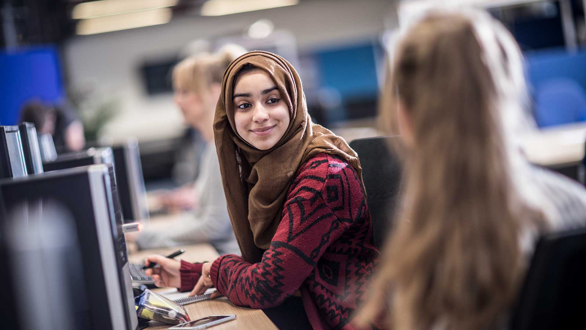 Female students in a computer lab