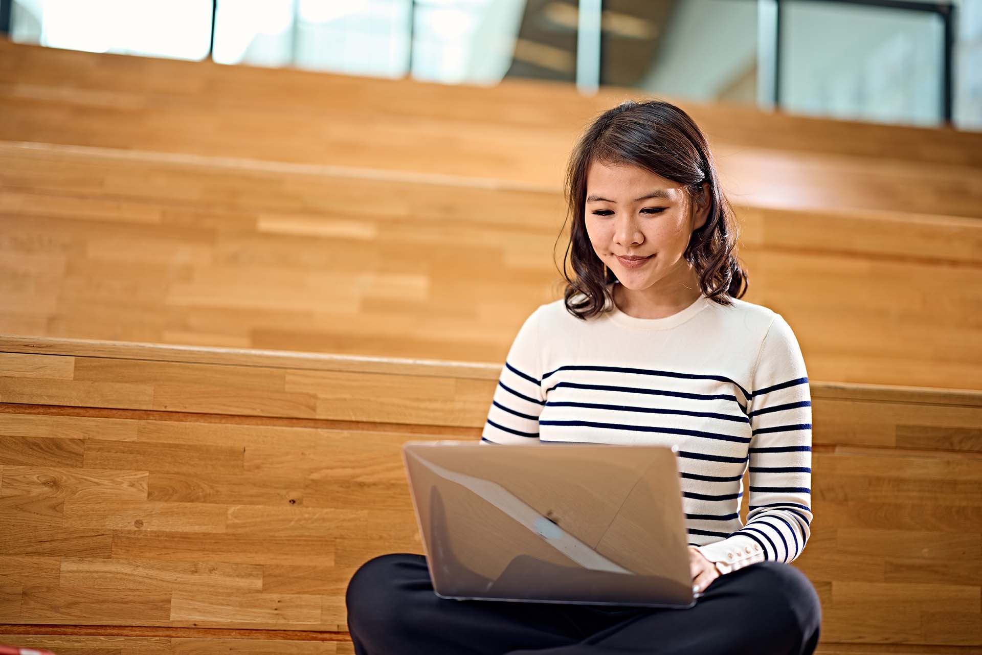 Female working on Laptop