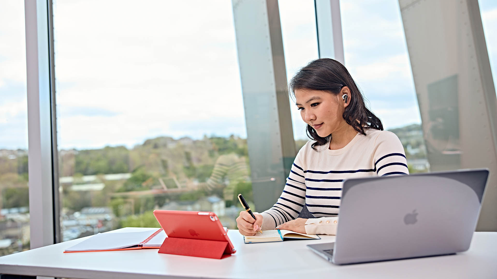 A girl working on her ipad