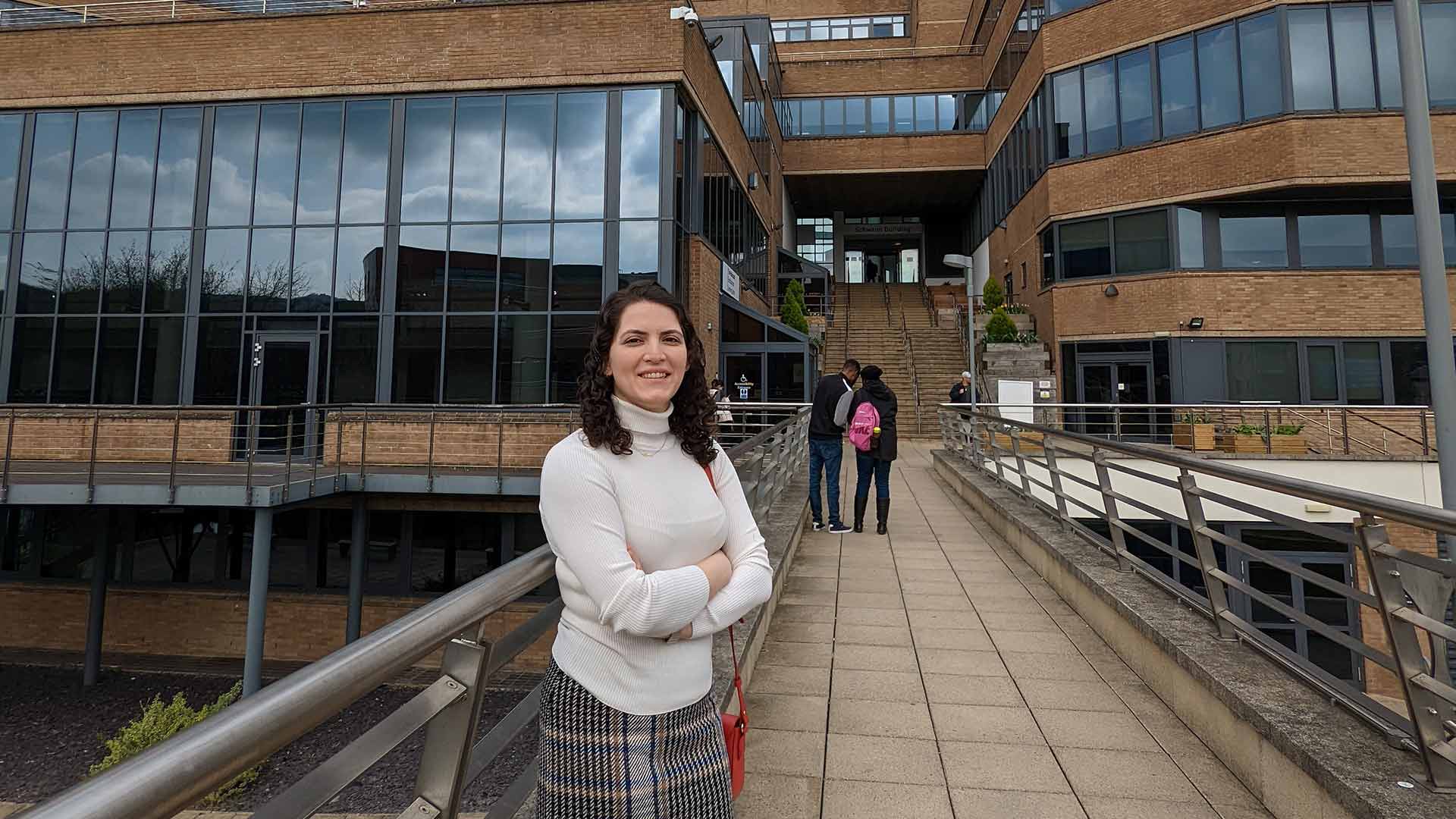 Fuzhan stood outside the University Schwann Building during a campus visit.