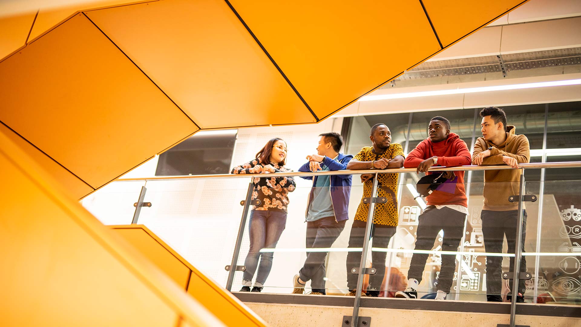 A group of students stood in the Joseph Priestley Building