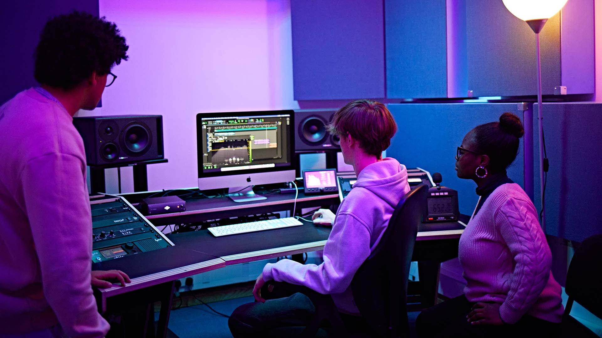 3 students in music room