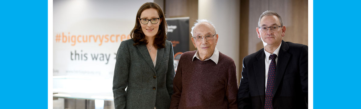 Centre Director Emma King, Holocaust survivor Heinz Skyte (centre) and Shulmans LLP Simon Jackson