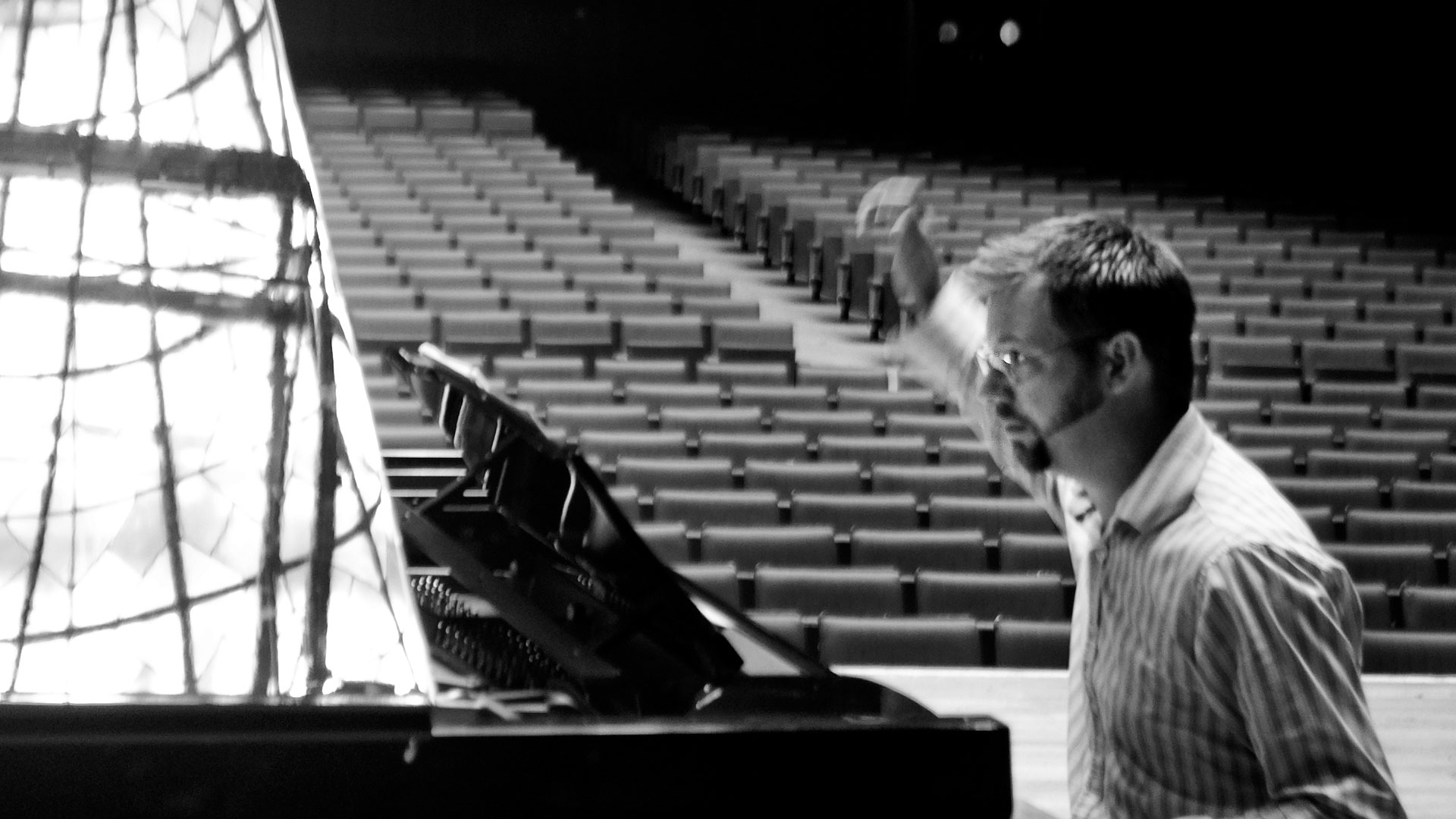 Philip Thomas playing piano