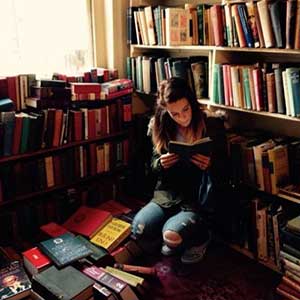Historian Emma Levitt reading and conducting research