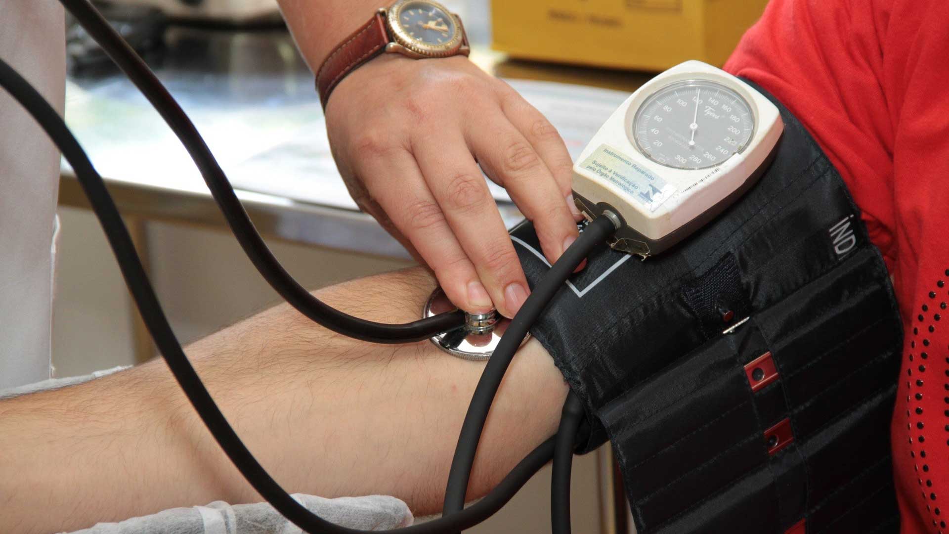 patient having blood pressure taken