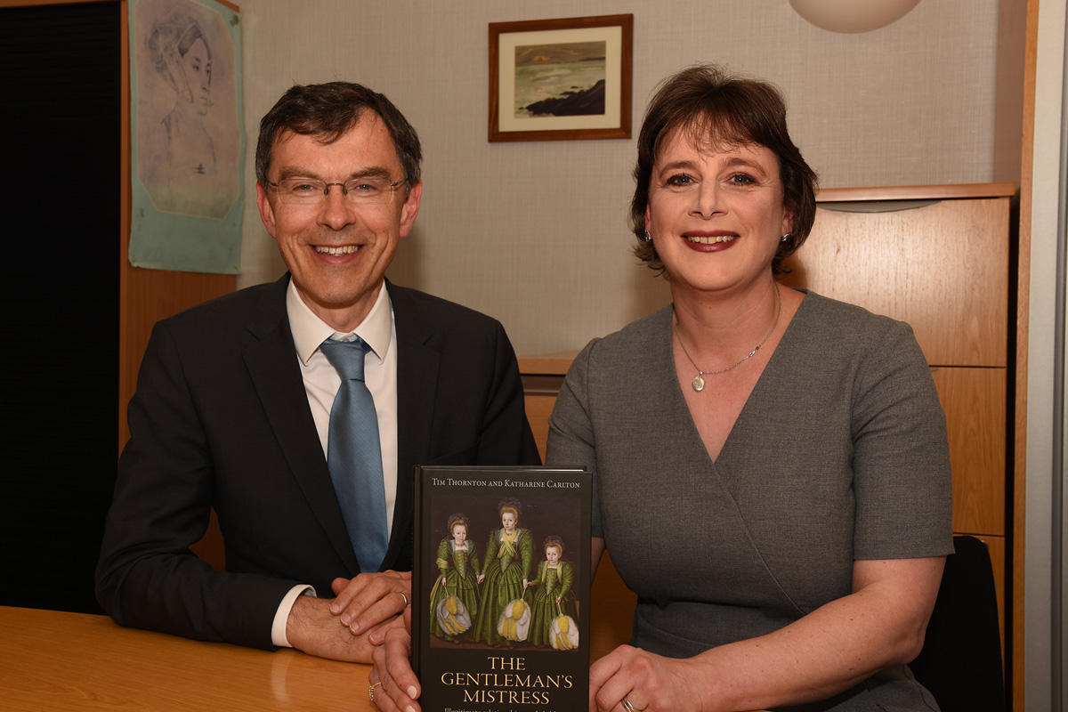 Professor Tim Thornton and Dr Katharine Carlton holding their book - The Gentleman's Mistress - Illegitimate relationships ad children, 1450-1640