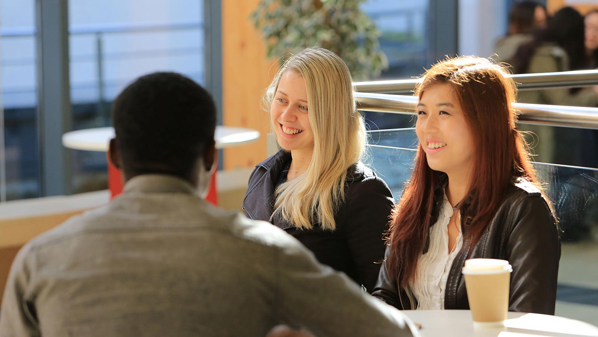 Huddersfield Business School students drinking coffee at The Street Cafe