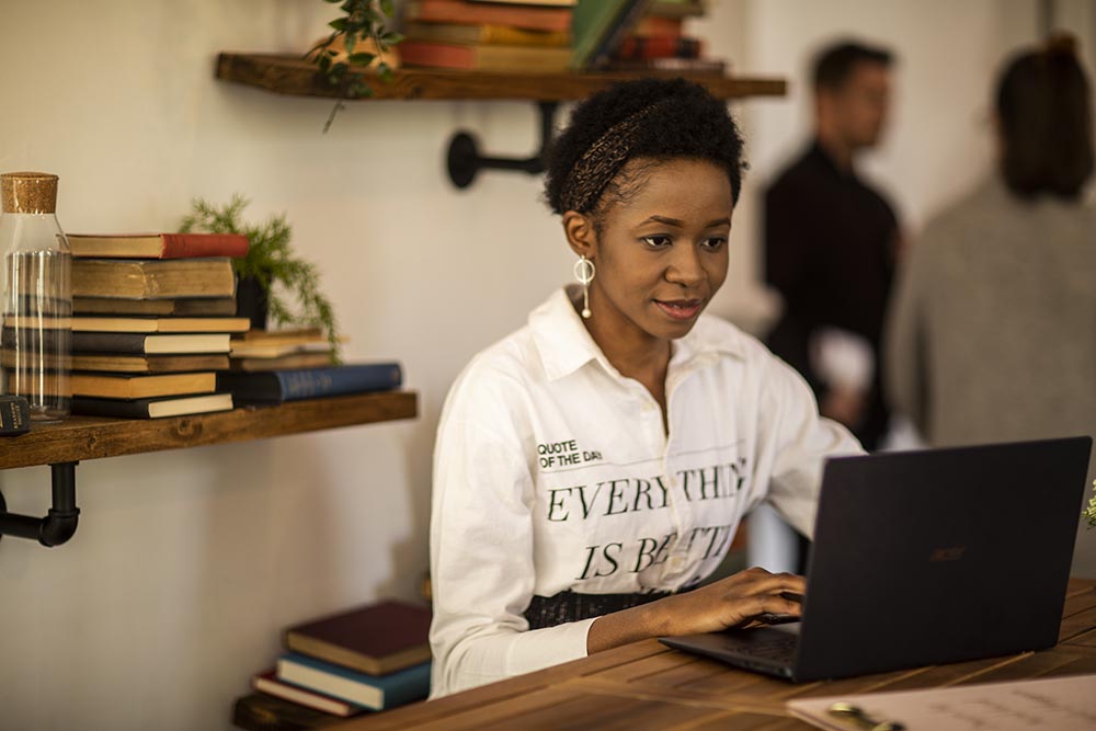 Student off campus using a laptop