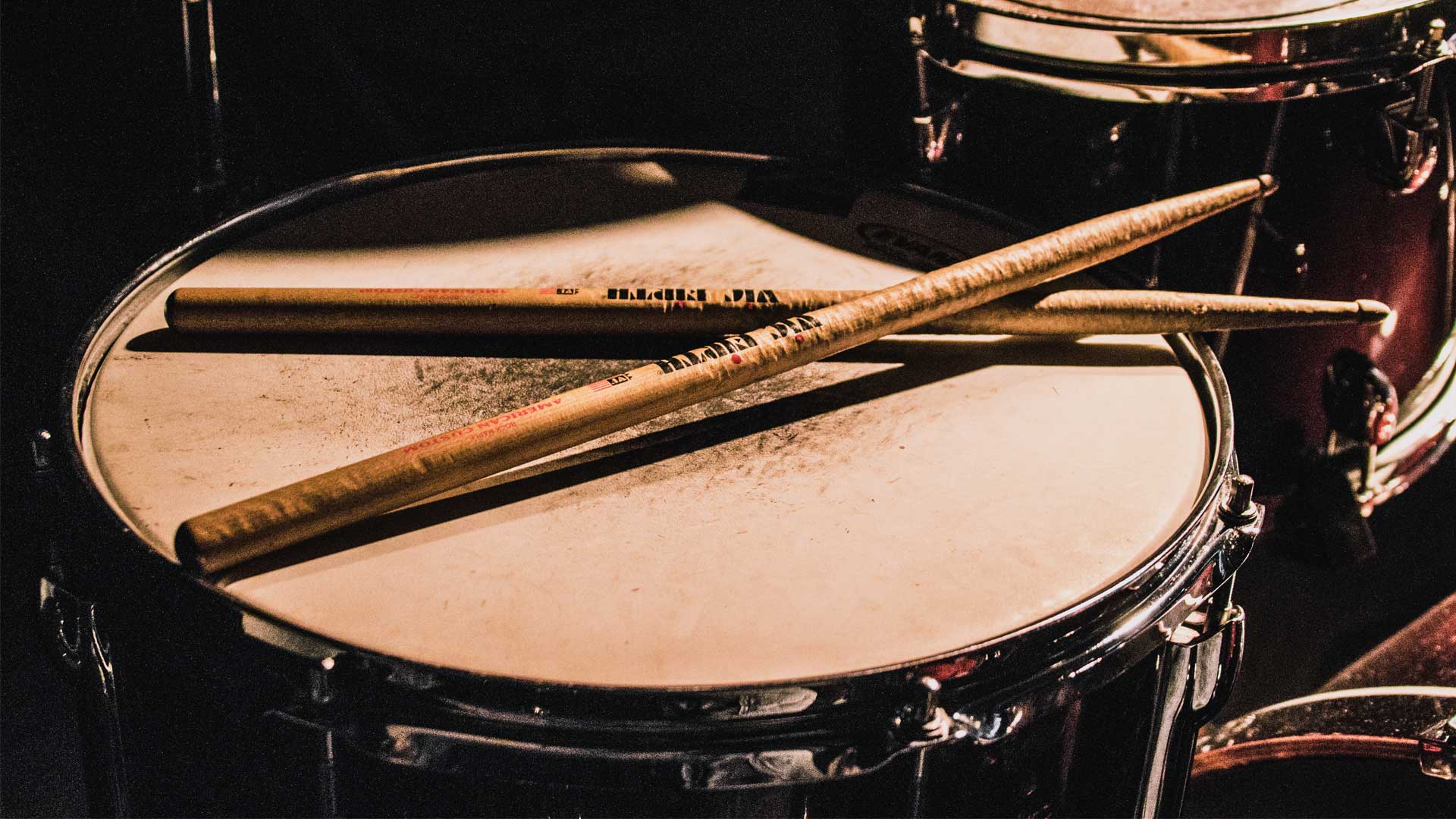 Close up of a Snare drum with cross sticks on the skin